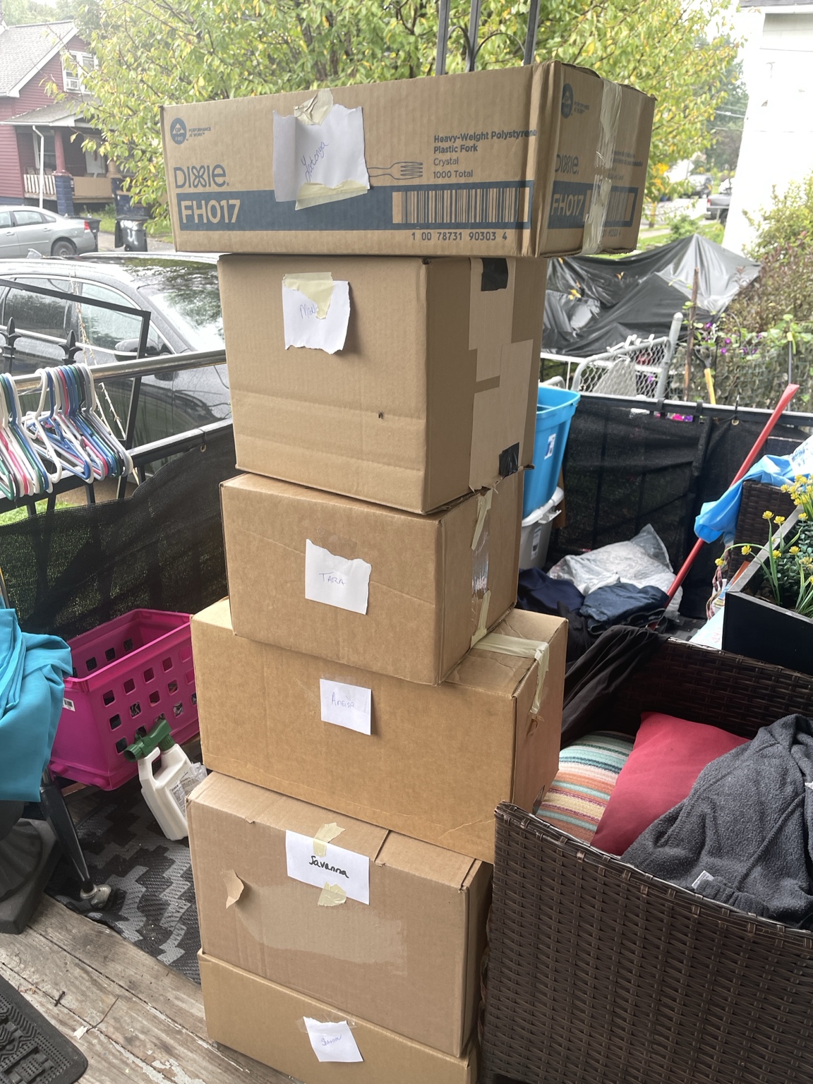 Boxed clothing gathered for the children’s clothing giveaway.