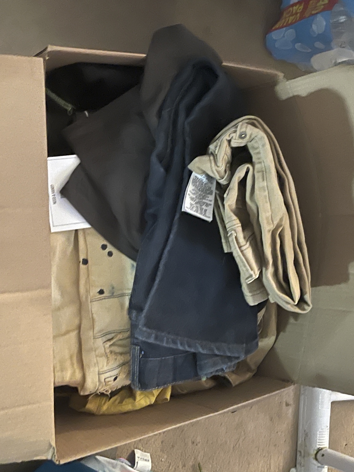 Pants and other clothing ready for the giveaway.